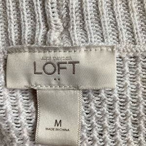 Open cardigan by the Loft . Medium , cream colored.